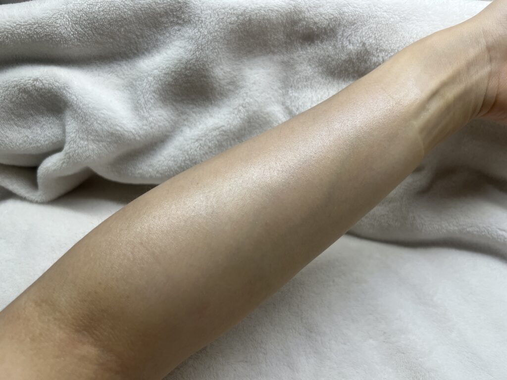 Theraderm Silky Nude sunscreen cream on arm
