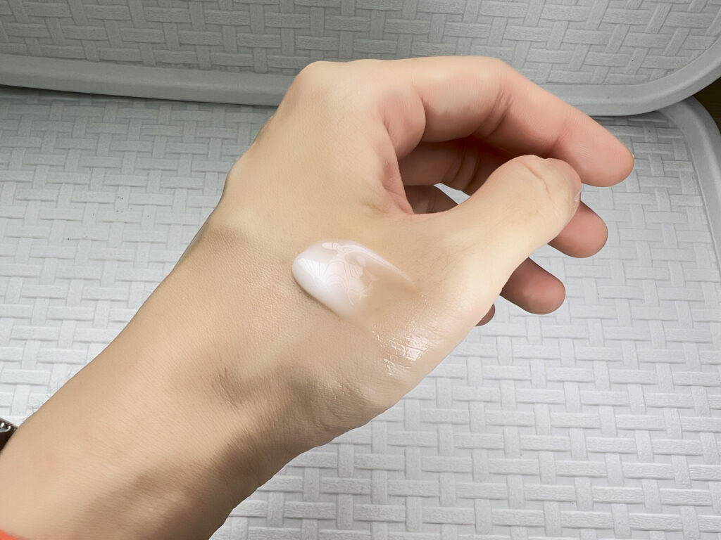 Applying Korean serum for dewy skin