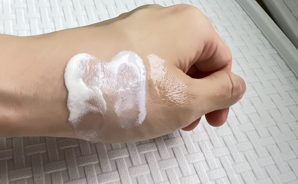 Korean sunscreen texture spreading across skin