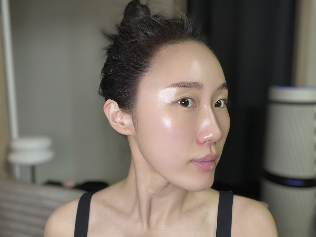 Three-quarter face view showing glow after product application