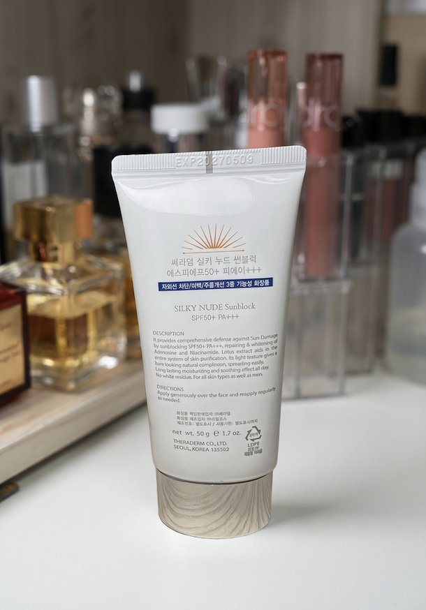 Section Theraderm Silky Nude sunscreen product packaging close-up